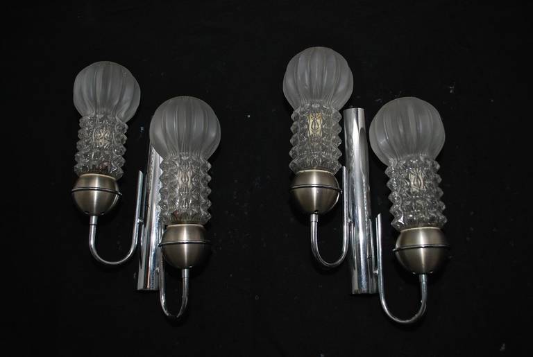A very unusual and rare 1970 sconces. The design is quit nice, the picture speak for it self. 
We have over 3,000 antique sconces and over 1,000 antique lights, if you need a specific pair of sconces or lights, use the contact dealer button to ask