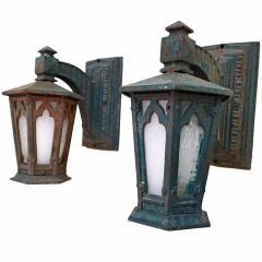 Pair of Antique cast iron outdoor sconces