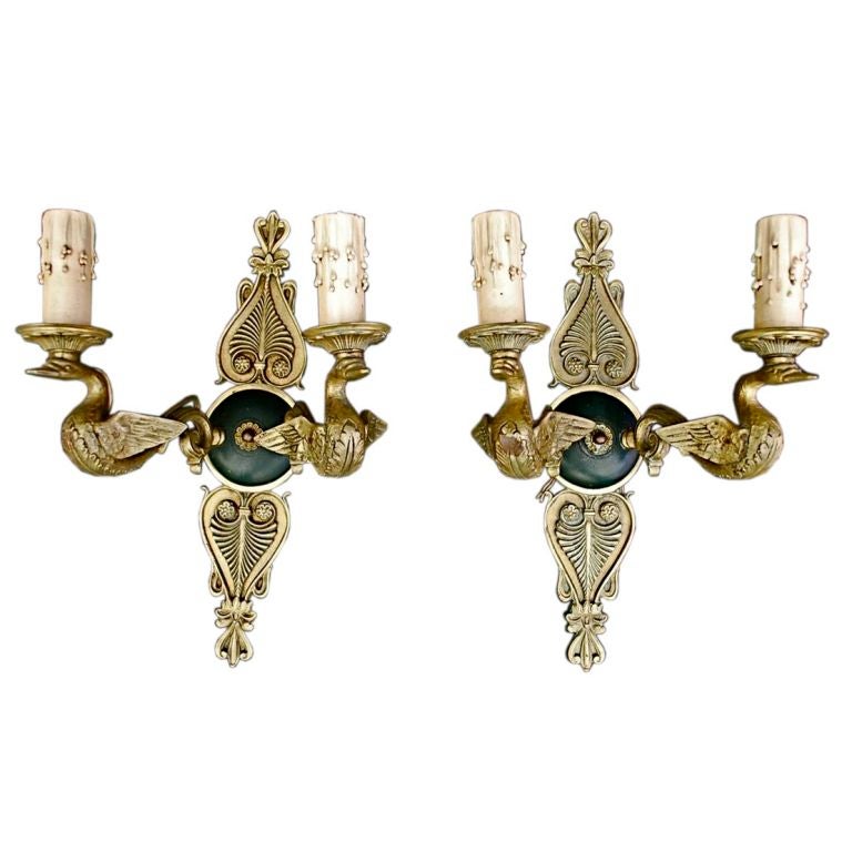 Elegant pair of French bronze sconces Empire style with swan