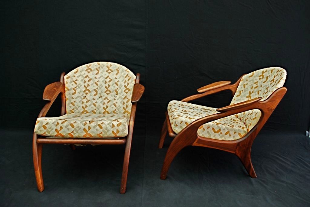 A beautiful and elegant pair of chairs BY ANDRIAN PEARSALL, it has the original fabric and it is in good condition, it has also the foot stool, but in different fabric, the patina of the wood is much nicer in person

ALL SALES ARE FINAL, STORE