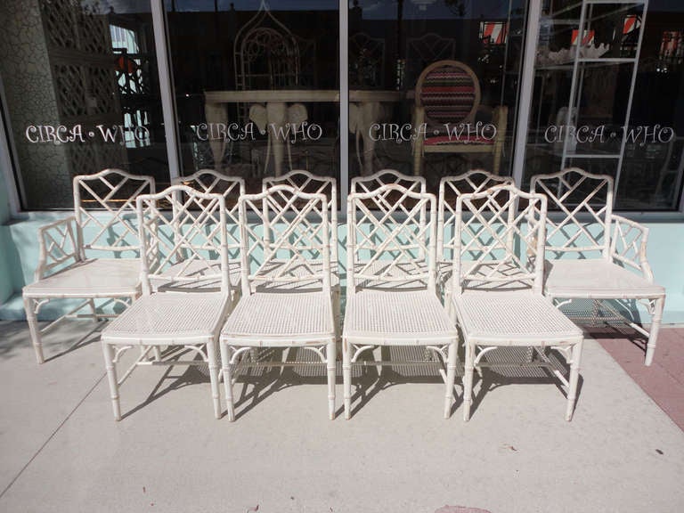 Hollywood Regency style faux bamboo Chippendale chairs.
Set of 10—2 armchairs and 8 side chairs.