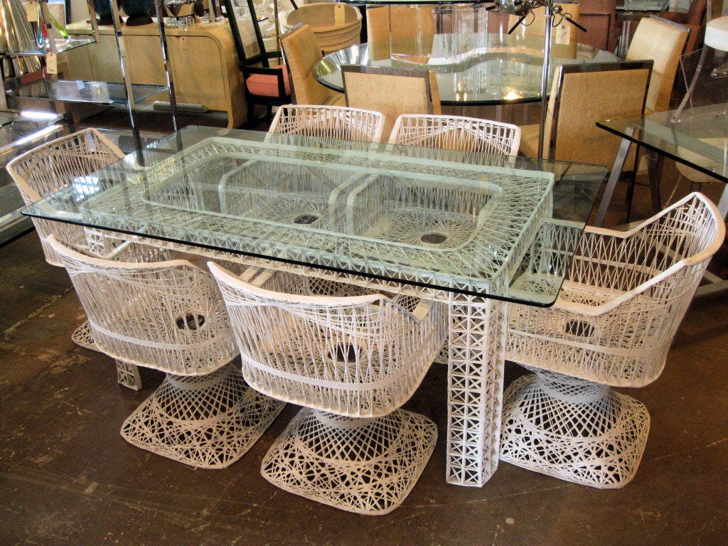 Web Spun Fiberglass Table and 6 arm chairs. <br />
chairs:  32