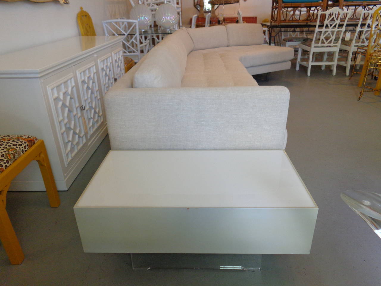 Vintage Vladimir Kagan omnibus sofa with Lucite legs in nice as found vintage condition. The sofa is in two sections.