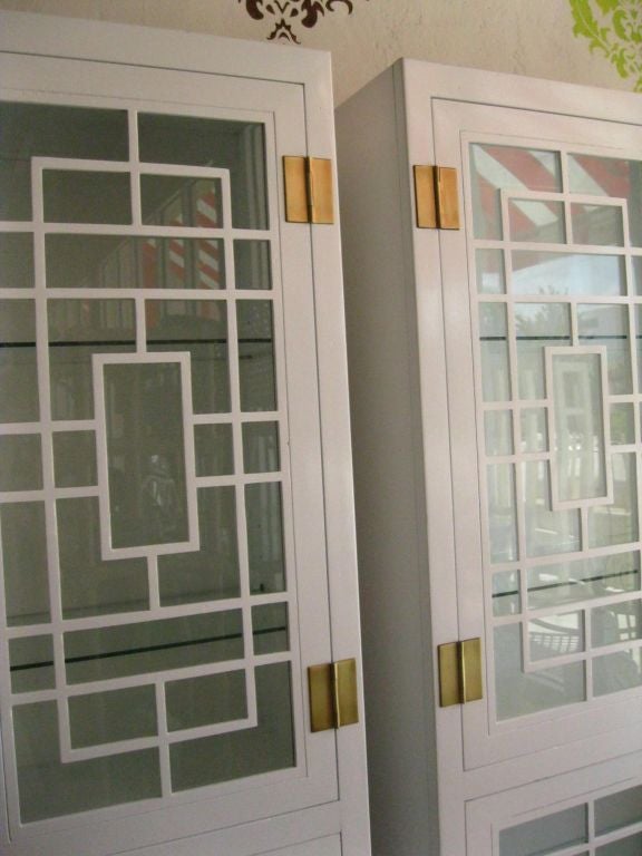 Pair of Lacquered Fretwork Cabinets 1
