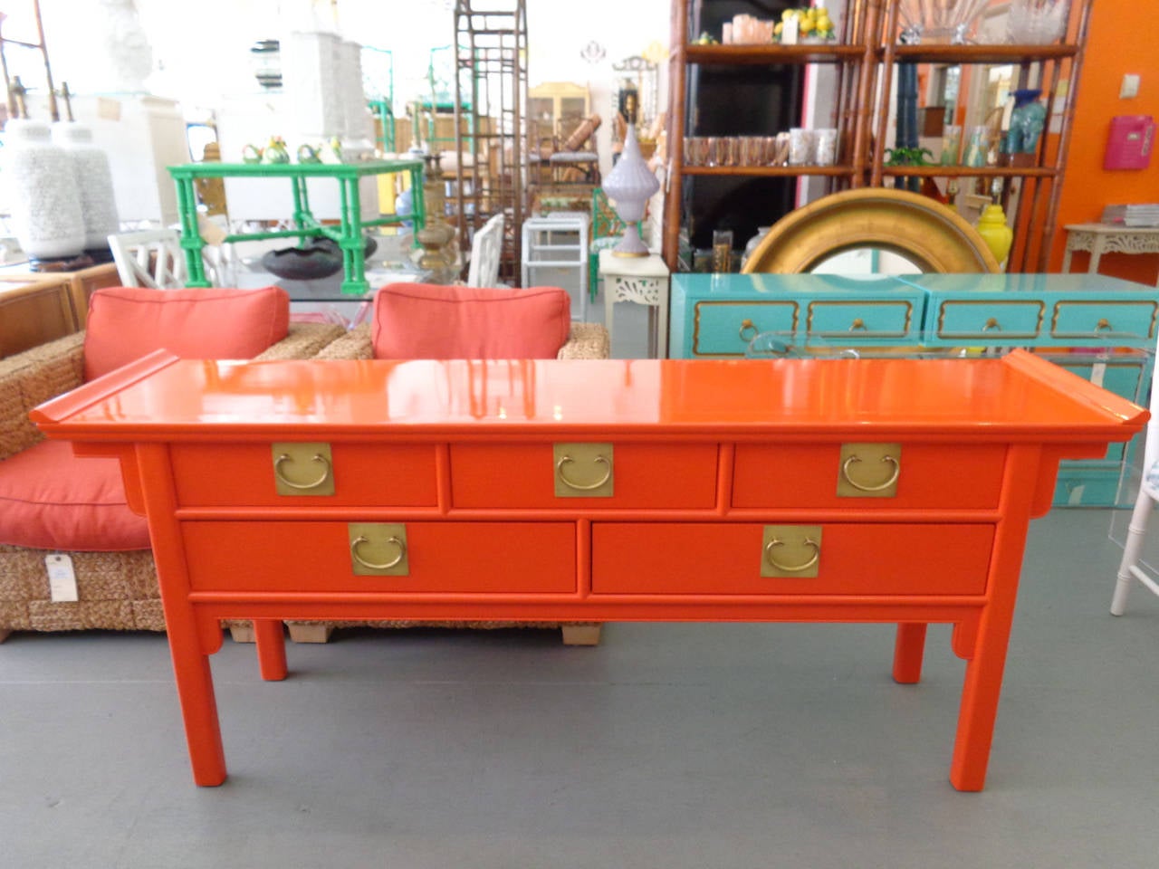 PAGODA Console in nice as found VINTAGE condition. There are minor imperfections to the NEWLY lacquered finish. Benjamin Moore Blazing Orange