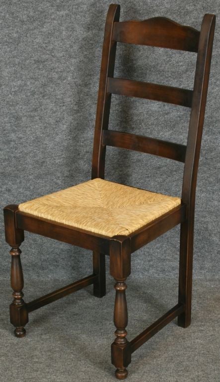 A Set of 6 Rustic French Country Dining Chairs in oak with rush-bottom seats and a nice ladderback design