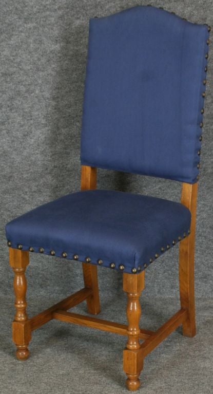 A charming set of 6 French Country Dining Chairs in oak with turned legs and blue upholstery