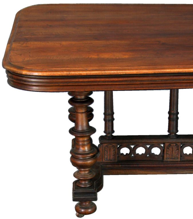 An Antique Henry II Renaissance-Style Pub Table from France in walnut with nice turned legs.