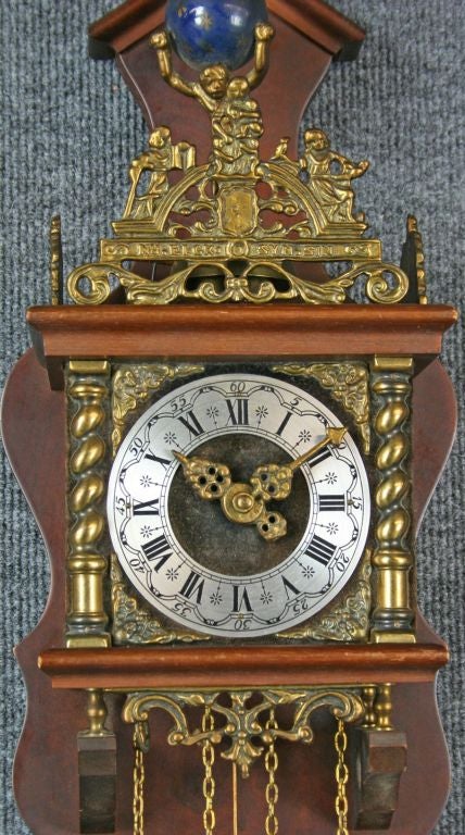 zaanse dutch wall clock with atlas
