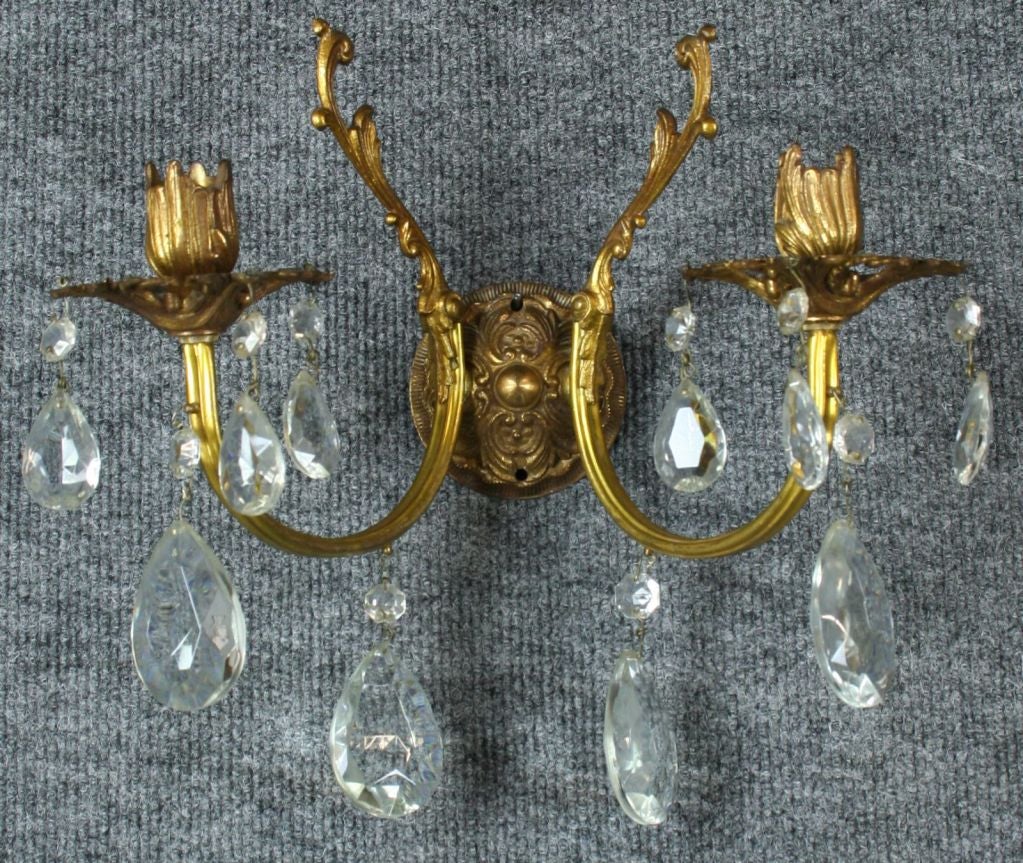 A charming Pair of Rococo Style Glass Sconces from France circa 1950.