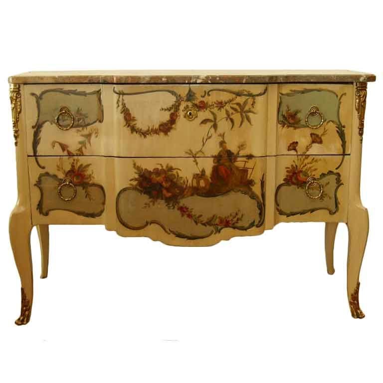 Early French 1920s hand-painted two-drawer commode with Marble Top.
The drawers have brass pulls and gilded bronze conner coverings hardware at the corners in Neoclassical Design.
