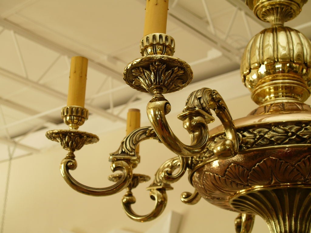Massive beautiful 8-Light French Neoclassical Bronze chandelier with exceptional detail from top to bottom.
European Wiring and takes 8 E 14 candelabra light bulb.
In good vintage condition with signs of wear and tear to the plastic sleeves and some
