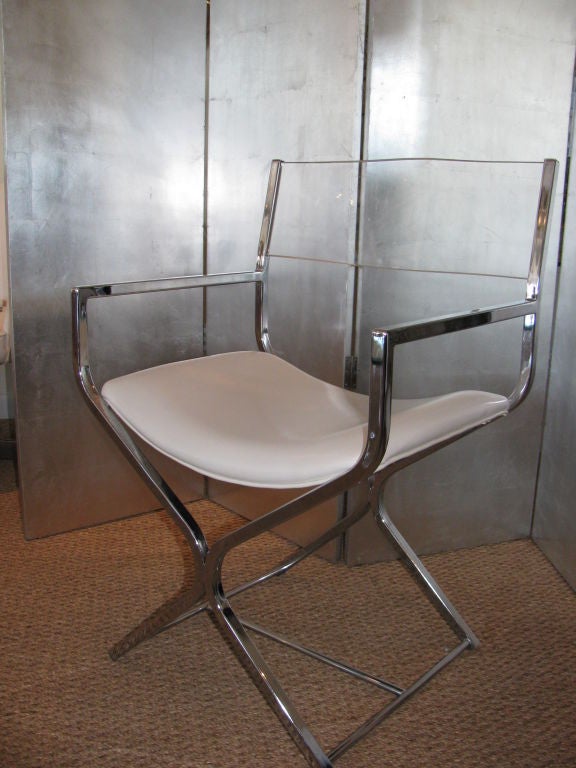 Great chrome and lucite chair fabricated in the 70's in the style of a directors chair.