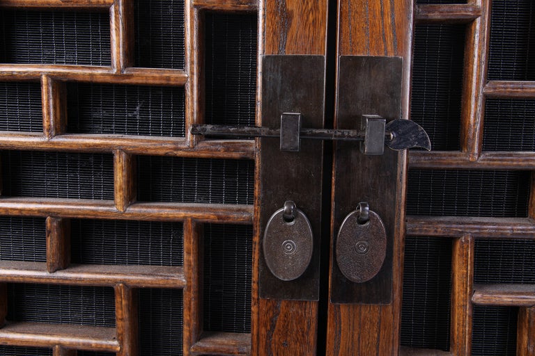 Chinese Pair of Cabinets with Lattice Panel Doors