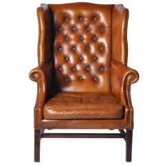 A Wingback Leather Arm Chair
