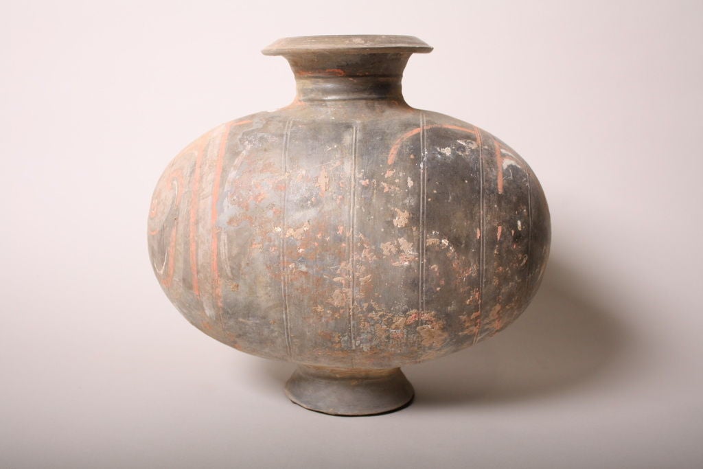 Rare Han dynasty silk worm cocoon shape tomb jar.  Geometric pattern with incised bands.