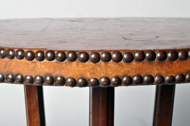 Mid-20th Century A Round Table with Leather Top