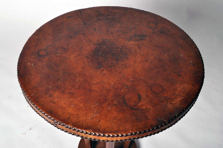 A Round Table with Leather Top 1