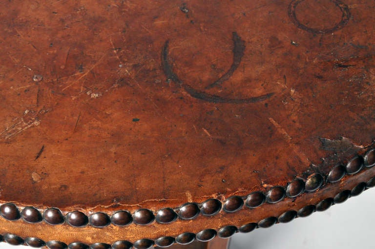 A Round Table with Leather Top 2
