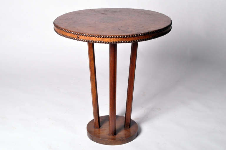 This French leather-covered side table has a beautiful patina and lovely studded nail head detail. The frame is made from Oak.