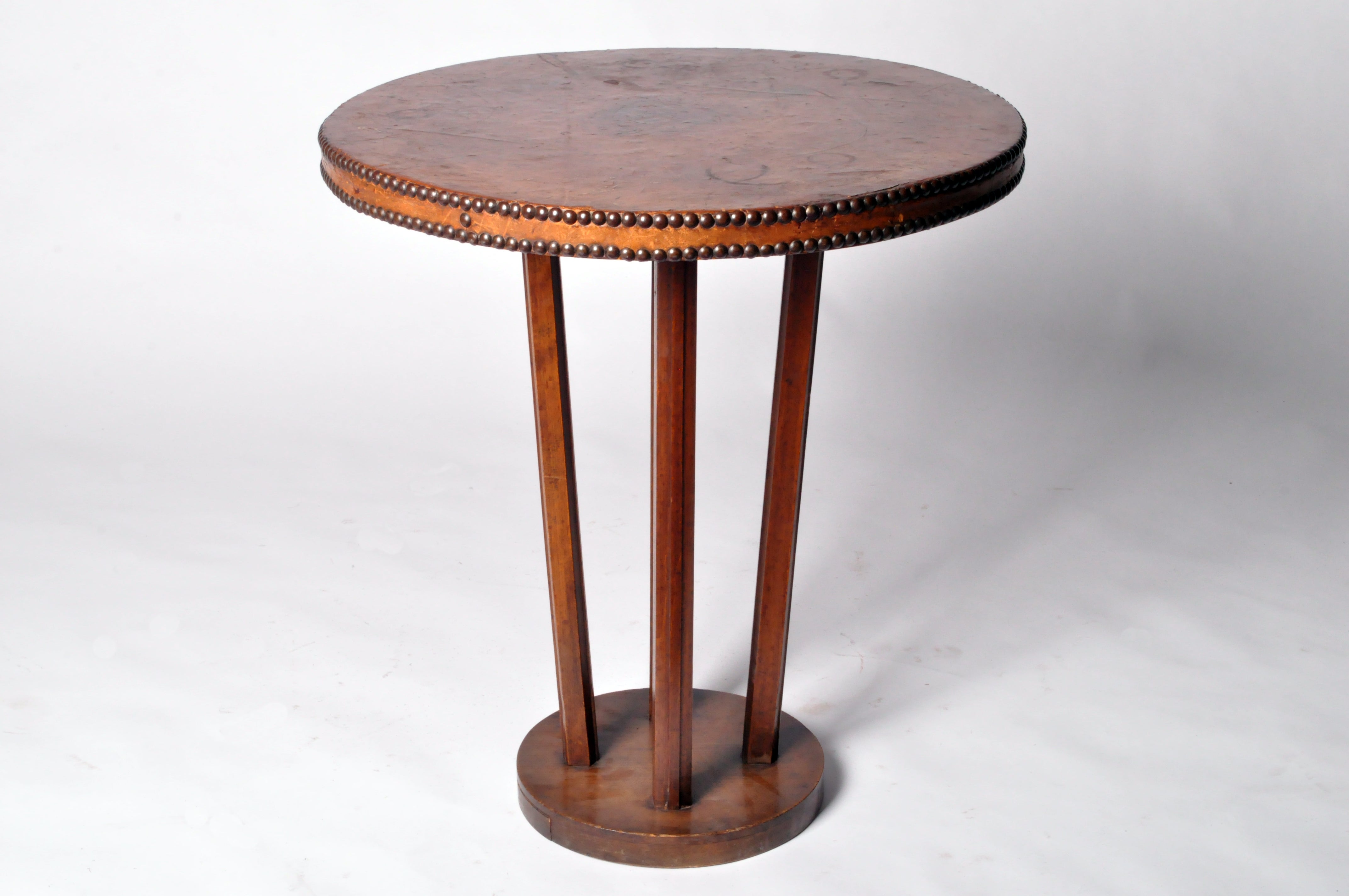 A Round Table with Leather Top