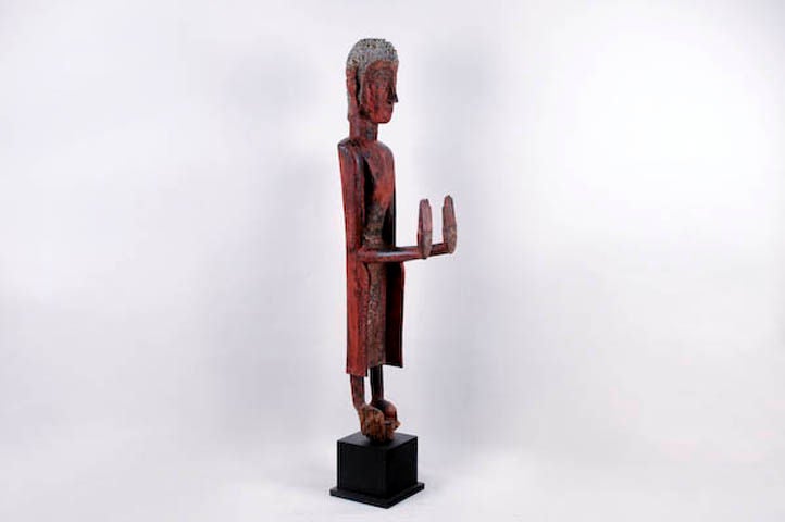 Sacred sculpture with original red lacquer patina. This rare piece adds color to your room or office.