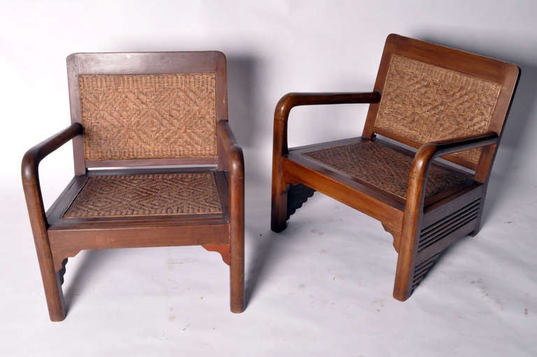 These lounge chairs feature a teak wood frame with Art Deco detailing on the base. The caning on the seat and back has a subtle geometric pattern.

Only One Available