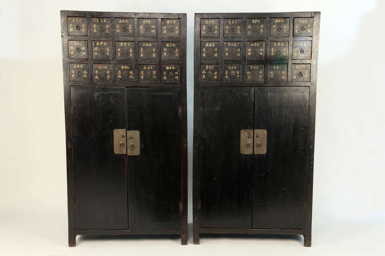This beautiful 19th Century medicine cabinet is made from elm wood and has 15 drawers. Chinese medicine chests were used for storing medicinal herbs.   Large chests were used in medicine shops while smaller chests would sometimes be found in wealthy