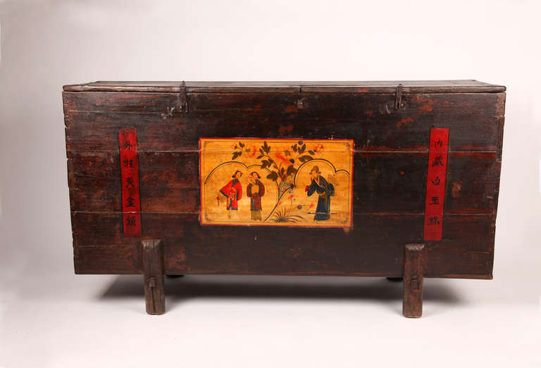 This gorgeous 19th century painted Chinese chest is made from pine wood. The top opens up for additional storage space.