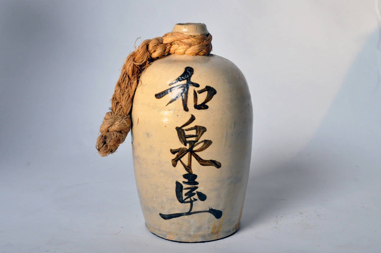 As the predecessor to modern-day growlers, the purpose of these bottles were just as straightforward. They were made for Sake, or 'rice wine': filled, sealed, carried, stored, and reused as necessary in a residential setting in Japan. The bottles
