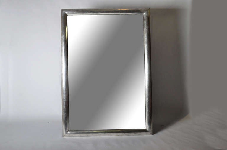 This substantial silver leaf mirror is made Pine Wood and dates to the 1930's.