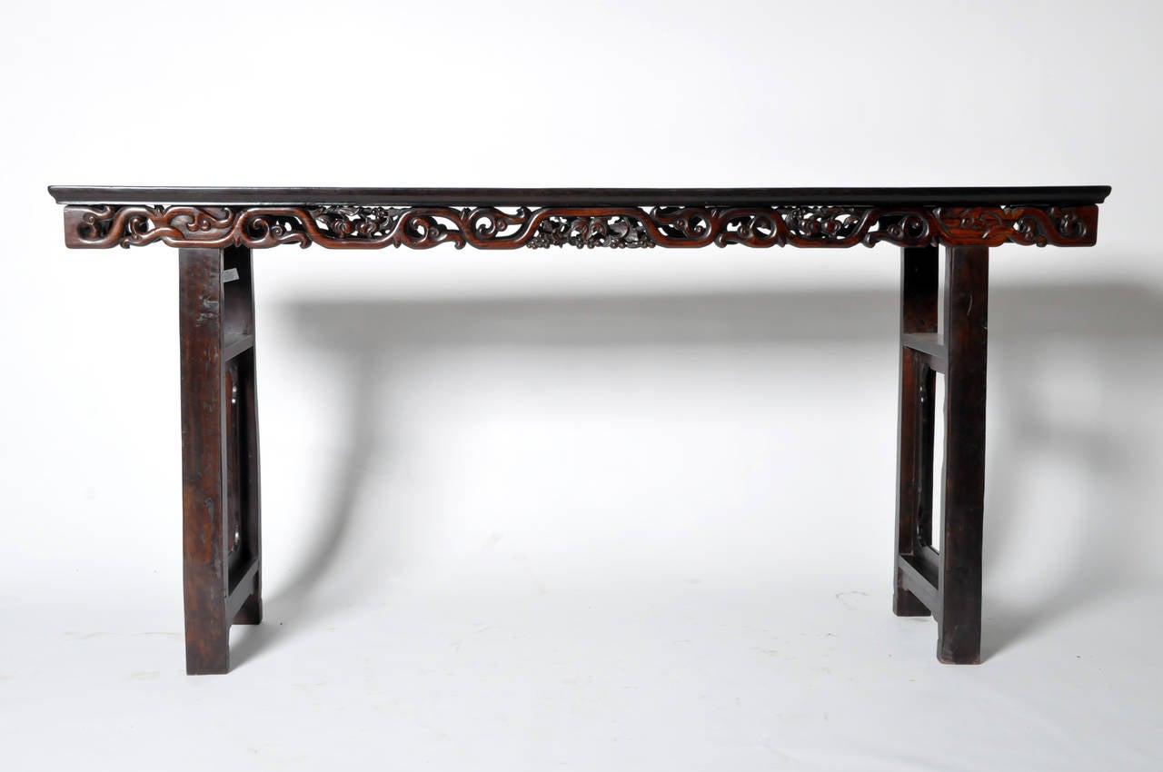 This marvellous hand-carved altar table is from Guangzhou, China and made from Hong Mu wood c. Qing dynasty. This altar table can be used as a console table or sofa table and is a great conversation piece.