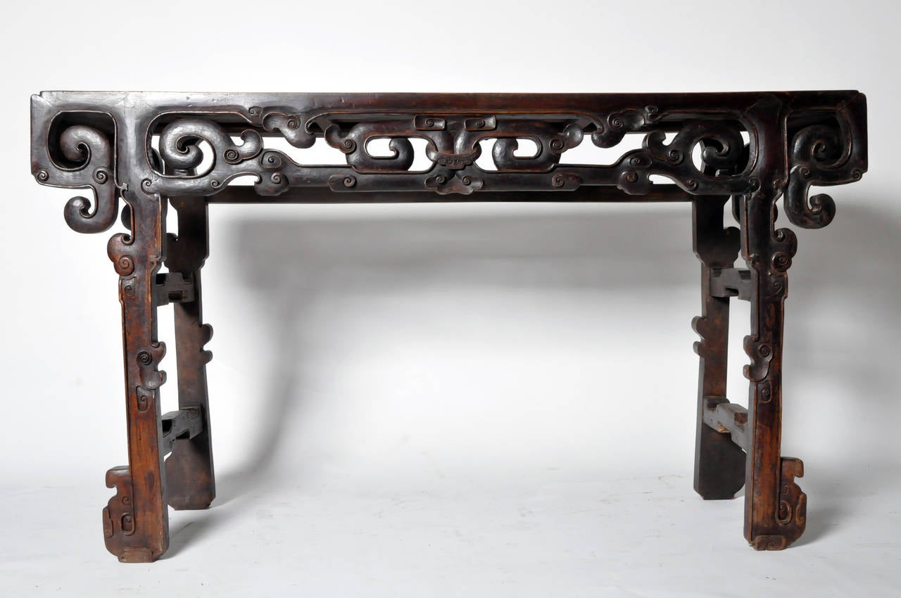 This impressive tall altar table is from Fujian, China and made from Nanmu wood c. Middle-Qing dynasty. Nanmu wood is a type of wood that was frequently used for boat building, architectural woodworking and wood art in China. This piece features