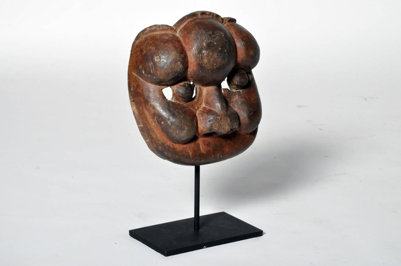 Hand-Carved Yangmu Wood Mask on Stand