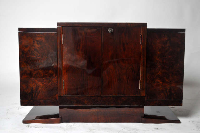 This elegant Art Deco convertible minibar is from Budapest, Hungary, circa 1930 and is made from Makassar Veneer and glass.