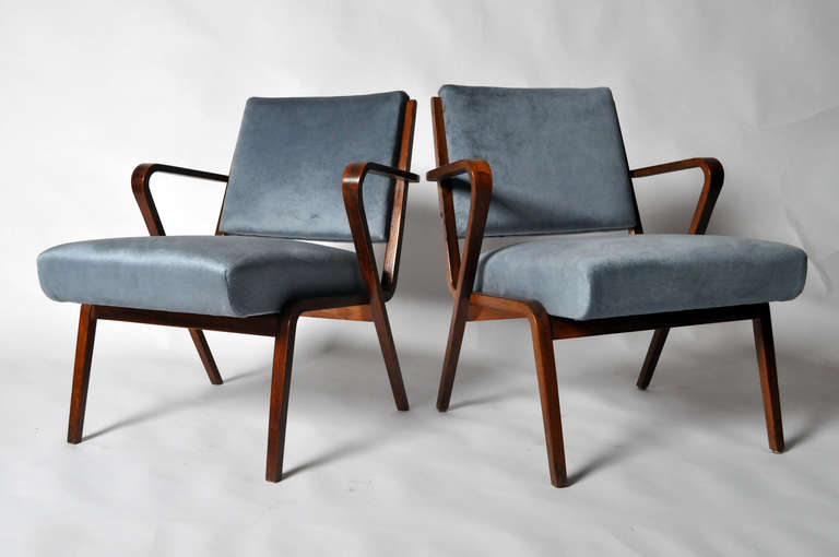 This pair of bent wood armchairs dates to the 1940's and are Czechoslovakian in origin. Fabric is new.
