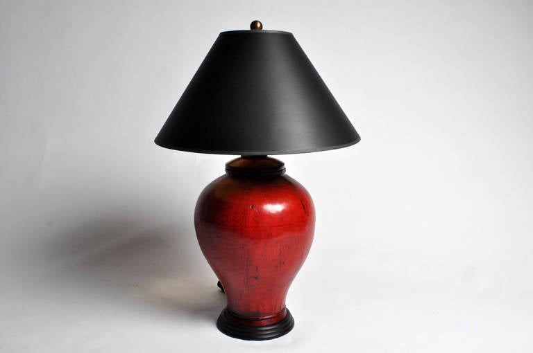 This gorgeous red wooden pot lamp is from Fujian, China and is made from firwood, circa 1870. It was originally a pot but it was converted into a lamp.