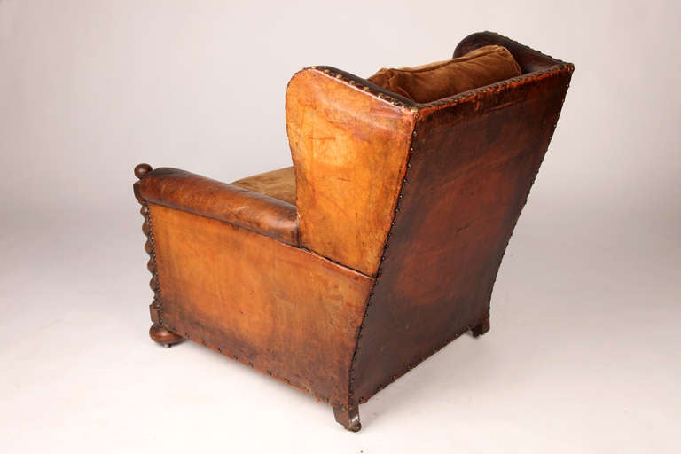 French Leather Arm Chair with Wood Posts at 1stDibs