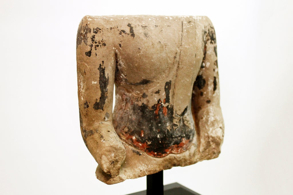 Torso of a seated Buddha