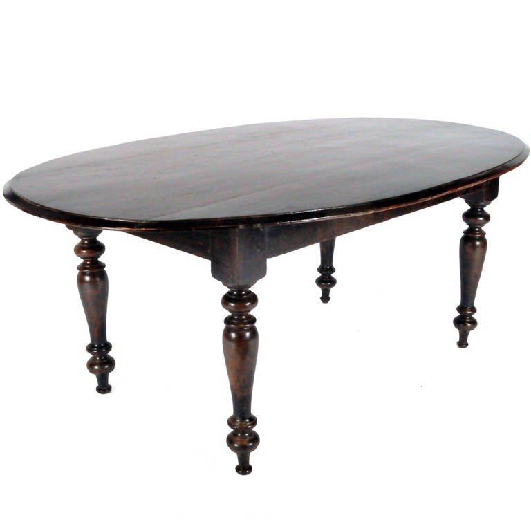 British Colonial Oval Dining Table For Sale British Colonial Oval Dining Table For Sale