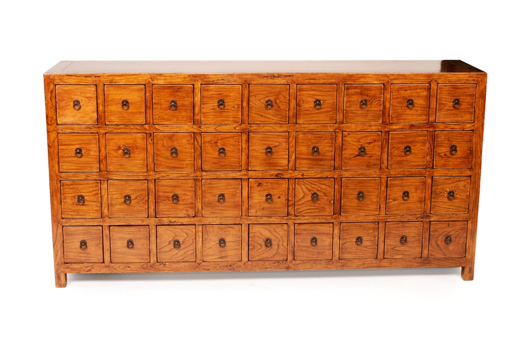 Apothecary cabinets that held Chinese medicinal herbs and natural remedies. This interesting chest has many drawers with each compartment's contents labeled on the front.