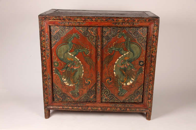 This beautiful Tibetan chest features unique and detailed painted doors.