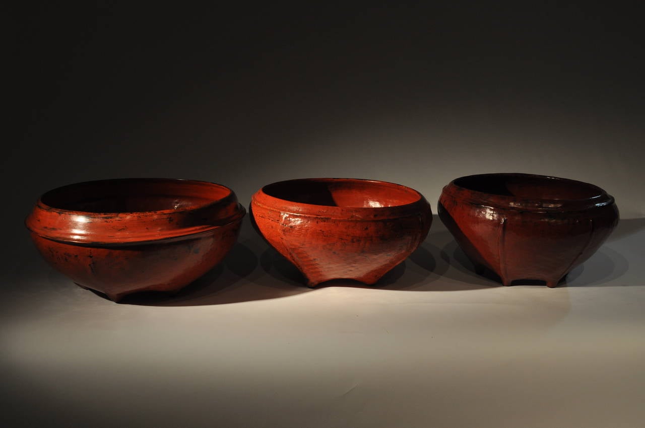 These Burmese lacquer-ware vessels date to the 1940's and are from the Shan culture. They are made from bamboo, rattan and covered in tree-sap lacquer. They are sturdy and practical and come in a variety of sizes.
