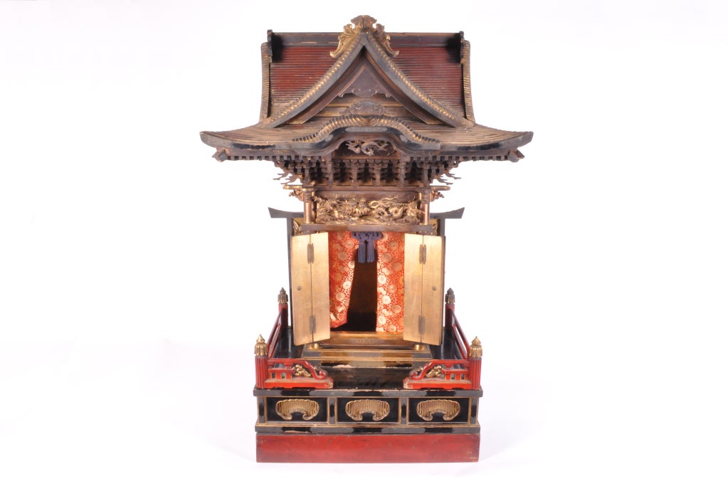 Shinto shrines are rarely available today and this one is a fine (and large) example. The shrine is from Meiji period (1868 - 1912 A.D.). Gilt bi-folded doors and a exquisitely carved dragon-motif lintel form the centerpiece of the structure. The