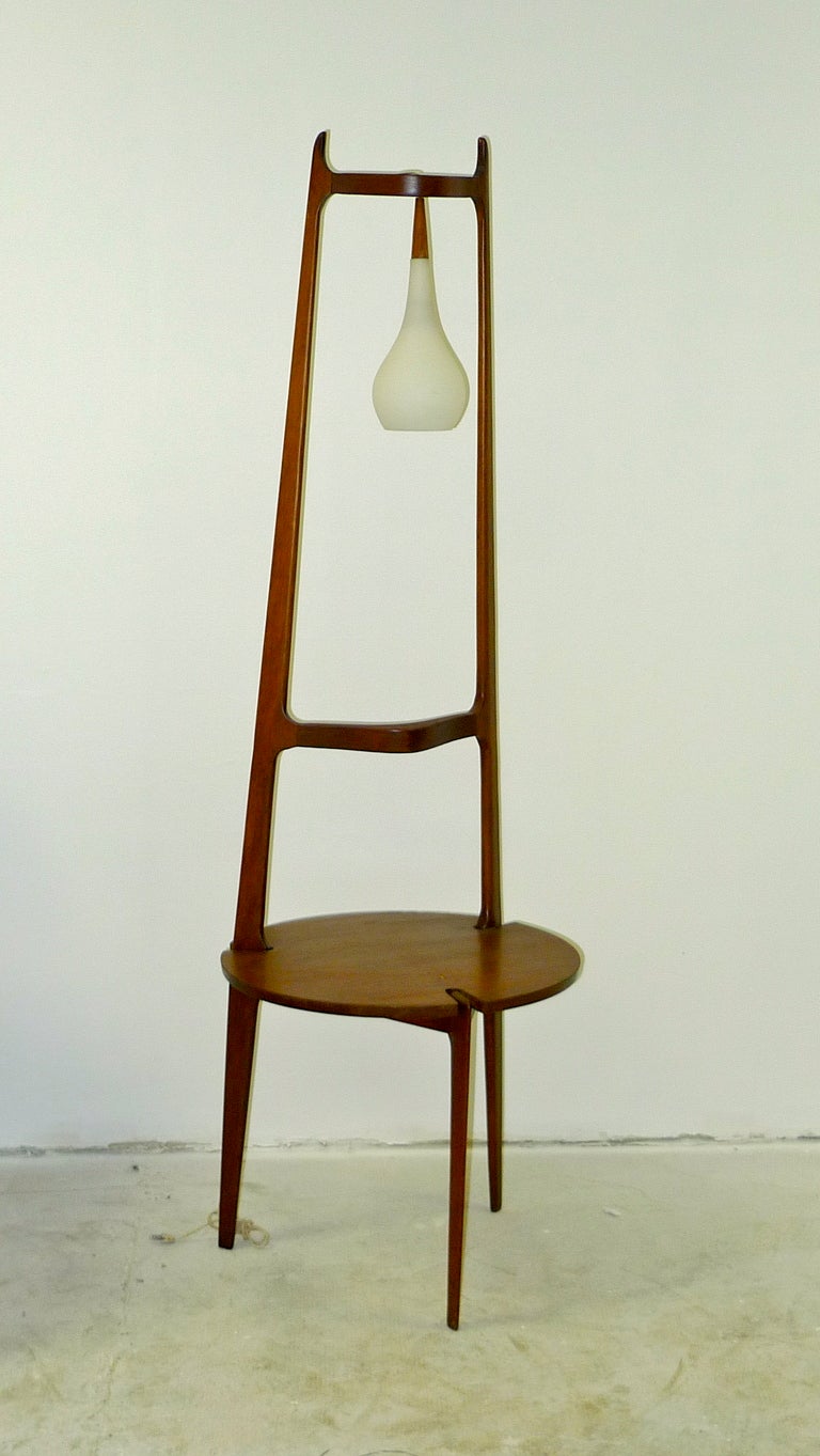 Sculptural walnut combination floor lamp and side table in the manner of Rispal