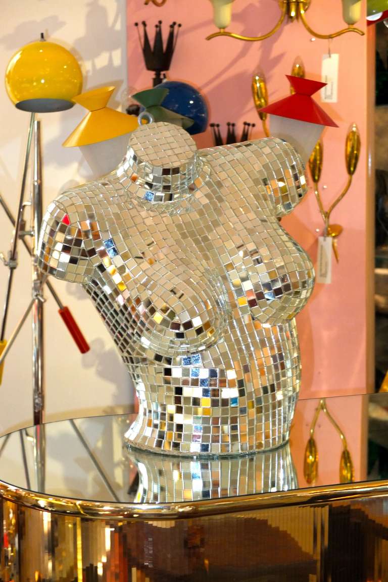 Vintage female upper torso mannequin finished in mosaic mirror tile like a disco mirror ball.  This is a fantastic decorative piece with a modern sculptural quality as well as delightfully sparkling and reflective,