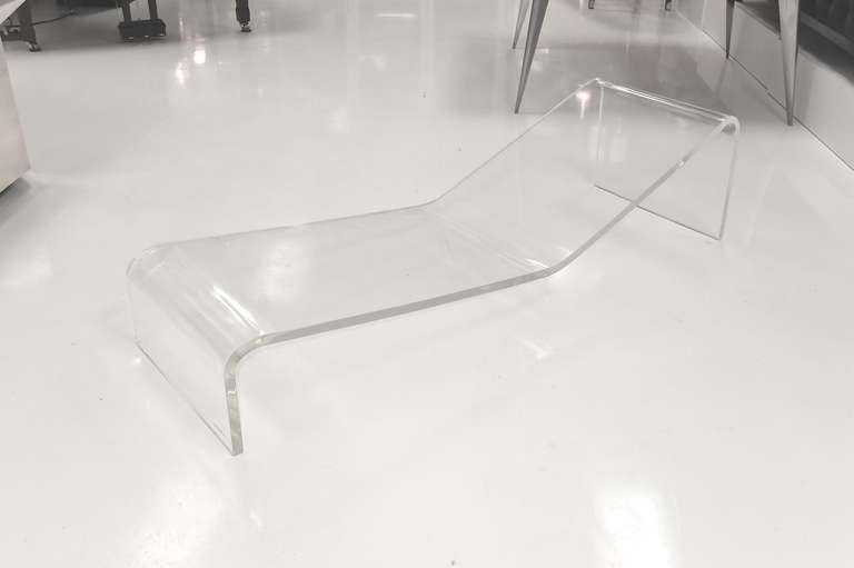 So what if Wonder Woman has an invisible plane......

Serene and be seen floating zen-like above the floor on this sculptural chaise lounge.

Engraved signature 'Gary Gutterman'

Could double as a long cocktail table while not in use as a
