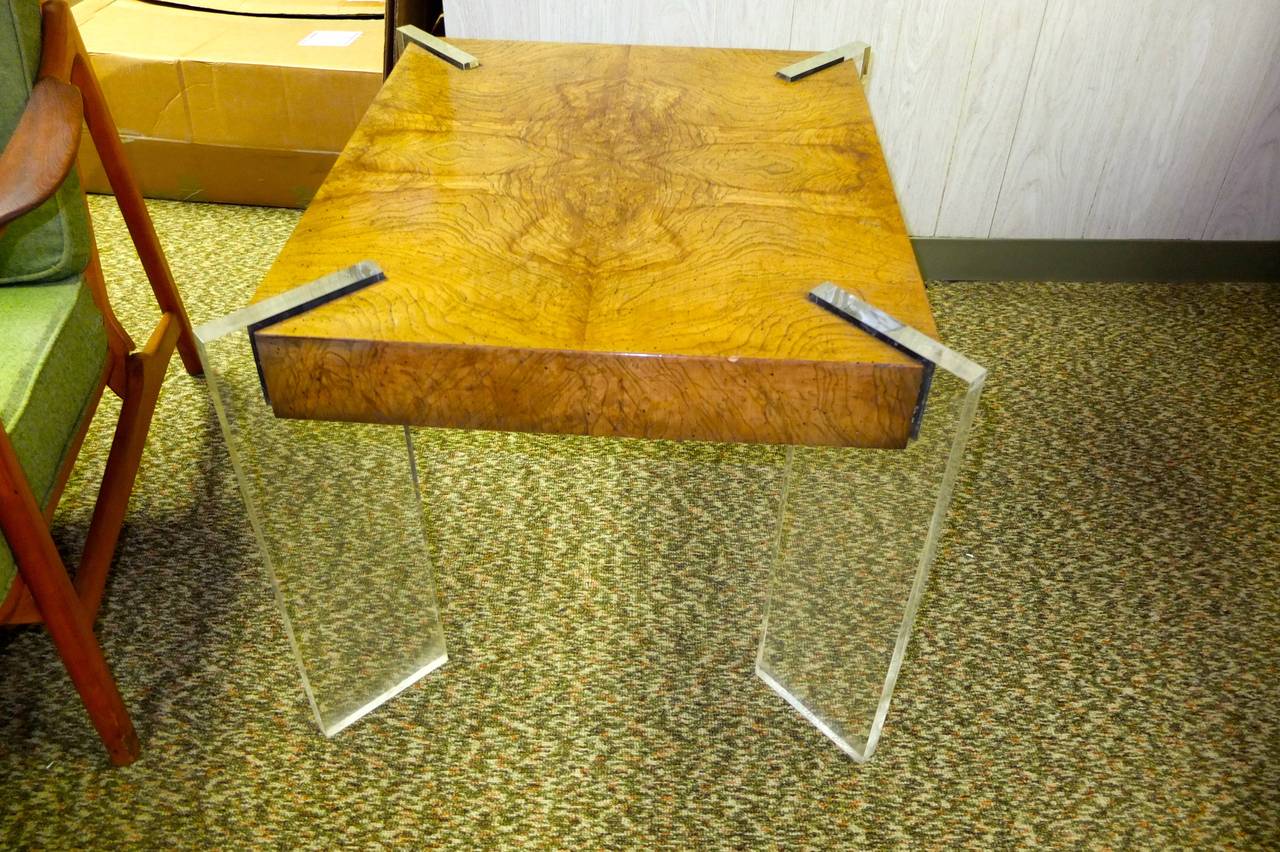 Stylish and well constructed rectangular side tables with burl wood top appearing to float on four slabs of inch-thick Lucite. This is the end table version of Kagan's better known cocktail table which had a round glass inset.

Measurements for the