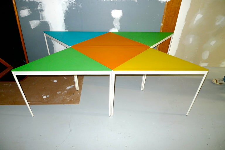 Jolly and practical and fun to play with, six individual triangular form 'Multiplication Tables' by Samsonite from the 1960's.  White enameled metal frame and composition board top wrapped in a thin plastic sheet in four vibrant colors....green,