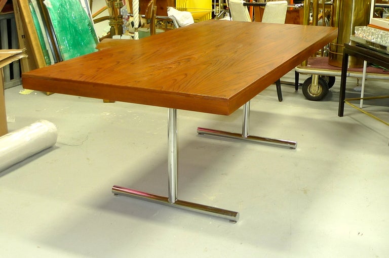 Hans Eichenberger Omega desk/table, by Haussmann and Haussmann, Switzerland, c.1957, imported by Stendig, oak top over chrome-plated steel base.

Top is newly refinished. Chrome base recently polished.

This table is part of the collection of